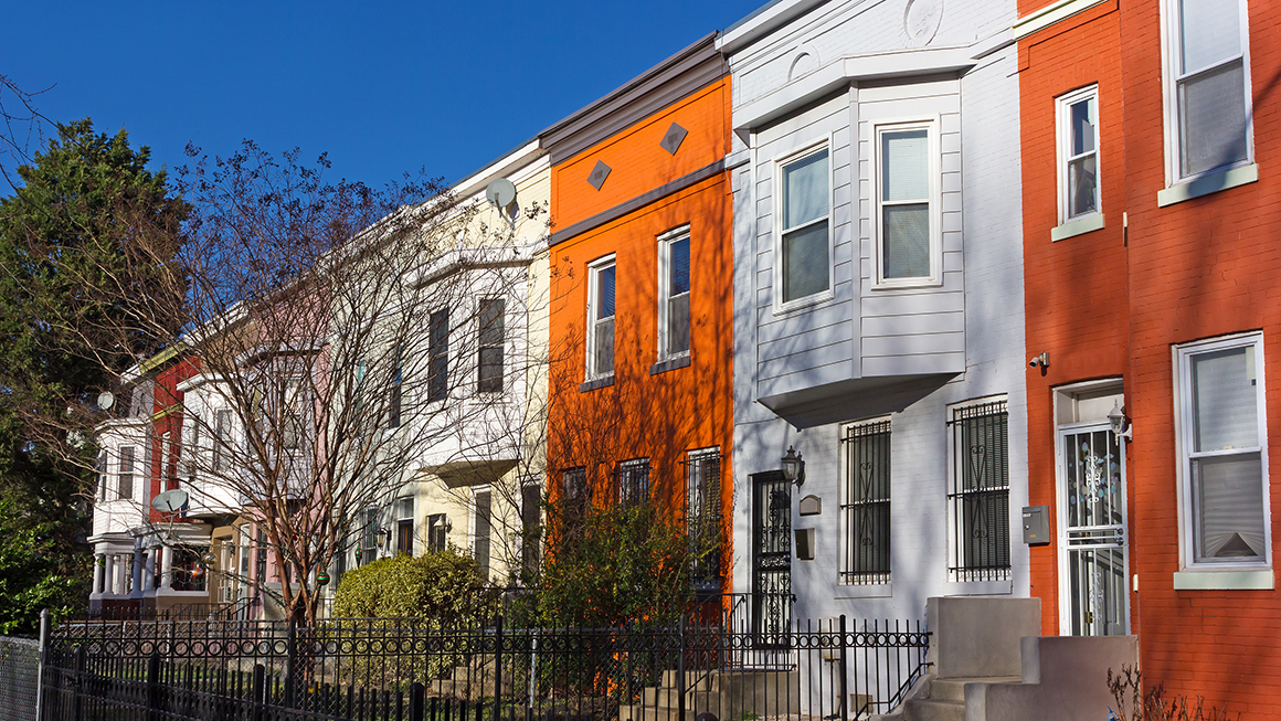 Historic townhouses in Shaw neighborhood on a quiet street.